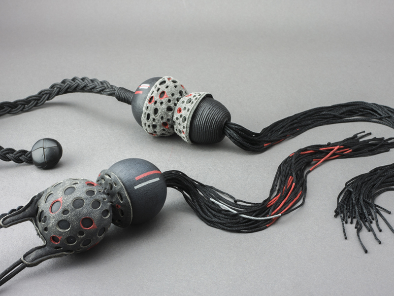 Nik Hanton, Duo Ball, 2015, pendants, leather, wood, textile, each 40 x 40 x 320 mm, photo: Spring Rees Nik Hanton, Duo Ball, 2015