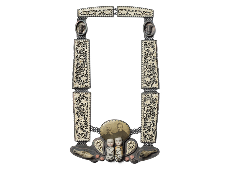 Barbara Paganin, Il Doppio (Double), 2015, necklace, oxidized silver, bone, porcelain, bronze painting, photo, coral, gold, 380 x 210 x 30 mm, photo: Michele Zanin Barbara Paganin, Il Doppio (Double), 2015, necklace, oxidized silver, bone, porcelain, bronze painting, photo, coral, gold, 380 x 210 x 30 mm, photo: Michele Zanin