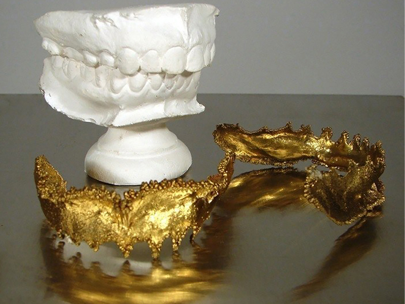 Lauren Kalman, Hard Wear (Oral Rims), 2006, gold-plated electroformed copper, plaster, 100 x 100 x 100 mm, photo: artist
