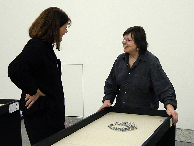 Petra Hölscher and Dorothea Prühl during the setting up of Prühl’s exhibition, Colliers—Necklaces