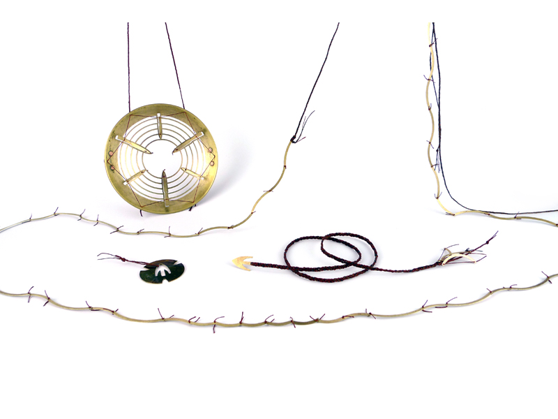 Melissa Cameron, Arrow 1:1, Bow 1:1, Target and Bulls-Eye, 2015, neckpieces, breastplate, pendant, antique brass and copper dish, waxed linen thread, largest 490 x 170 x 40 mm, photo: artist