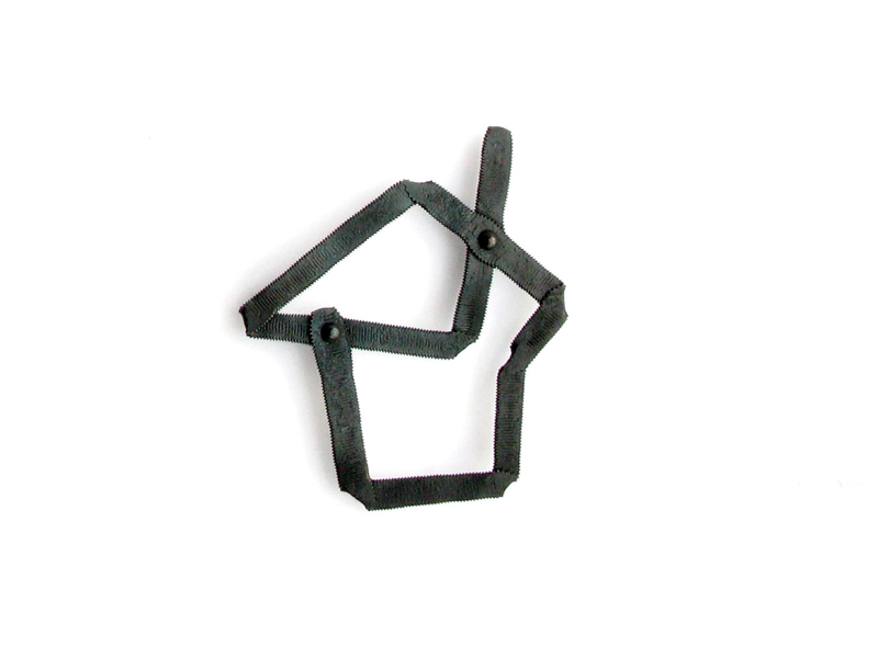 Nils Hint, Home, 2015, brooch, forged iron, readymade, 80 x 80 x 10 mm, photo: artist