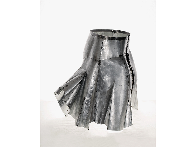 Naiza Khan, Armour Skirt II, 2008, galvanized steel, fabric zipper, 48 x 48 x 56 cm