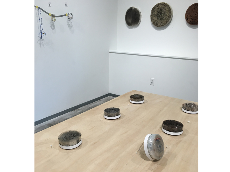 Motoko Furuhashi, from the exhibition CrossPASS, 2017, various brooches, tape, road segments, silver, brass, powdercoat, various dimensions from 76.2 mm (foreground) to 355.6 mm (background), photo: Shane Prada Motoko Furuhashi, from the exhibition CrossPASS