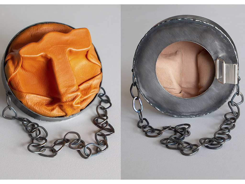 “The brooch is reminiscent of the body,” says Borgelin. “First you see the surface, but if you look closer you will discover the back/inside, and together they make up a whole. What you see at first glance is not always what we think it is.” | Teresa Alton Borgelin, Who I Am and Who You See, 2021, brooch, leather, iron, silver, alcohol-based leather paint, stainless steel, 110 x 110 mm, photo: artist Teresa Alton Borgelin, Who I Am and Who You See