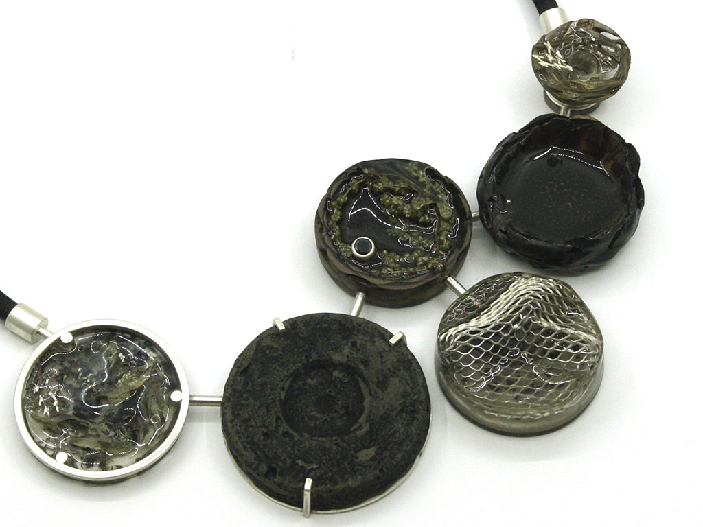 Jané Schoeman, Co-existence (detail), 2020, neckpiece, plant-based materials, silver, metal mesh screen, concrete, activated charcoal, synthetic gemstone, photo: Joani Groenewald Jané Schoeman, Co-existence
