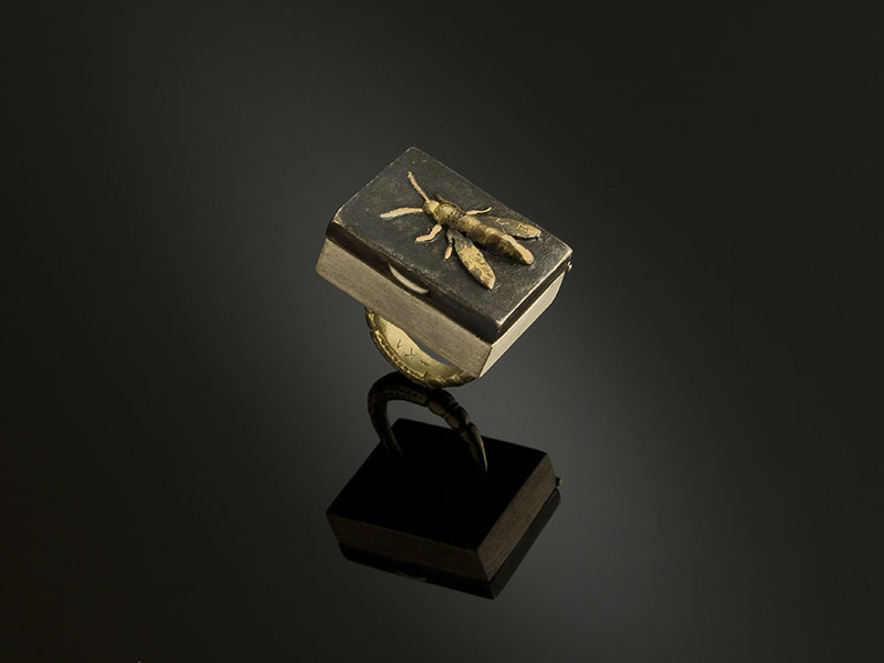 Keri Ataumbi, Kiowa, b. 1971, Ring, 2006, amber, silver, 14-karat gold, Heard Museum purchase, 4591-3