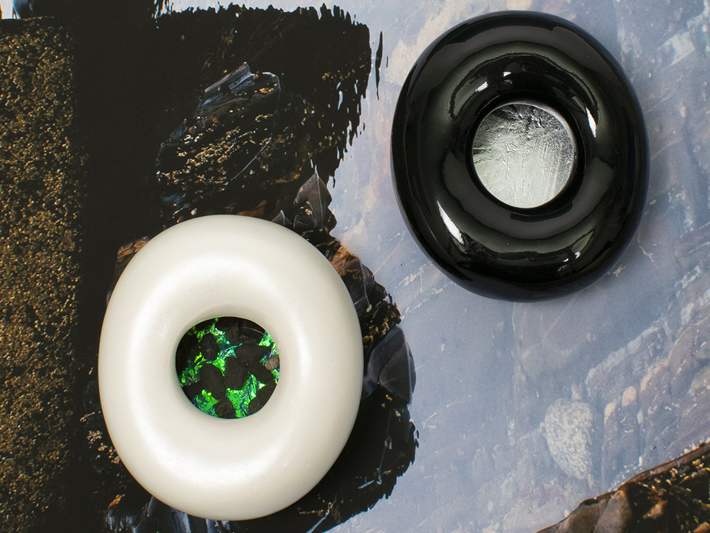 Claire Webb, So Within (detail), 2021, pair of objects, porcelain, glaze, gallium, fabric, cellophane, powdered pigment, silicone, rocks, 65 x 75 x 50 mm, photo: artist Claire Webb, So Within