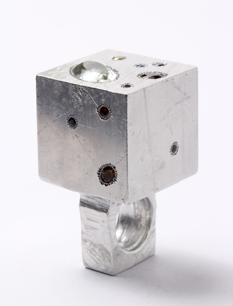 Karl Fritsch, Ring, 2012, aluminum , yellow and black diamonds , rubies, sapphires, garnets , golden citrine, green amethyst, amethyst, 80 x 50 x 50 mm