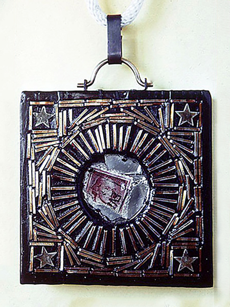 J. Fred Woell, Fetish, 1964, pendant, wood, glass, postage stamp, staples, 76.2 
