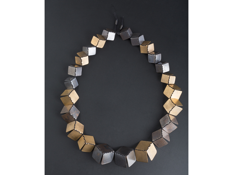 Tatjana and Peter Panyoczki, Untitled, 2015, neckpiece, oxidised copper, bronze, silk, largest element 25x25x25mm, 670mm long, photo: Marcel Tromp Tatjana and Peter Panyoczki, Untitled, 2015, neckpiece, oxidised copper, bronze, silk, largest element 25x25x25mm, 670mm long, photo: Marcel Tromp