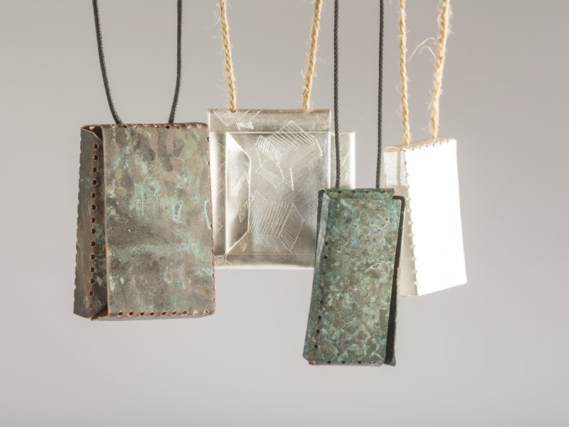 Tatjana and Peter Panyoczki, Untitled, 2015,pendants, patinated copper, fine silver, hemp, Japanese cord, approx. each 55 mm x 35 mm x 15 mm, photo: Marcel Tromp Tatjana and Peter Panyoczki, Untitled, 2015,pendants, patinated copper, fine silver, hemp, Japanese cord, approx. each 55 mm x 35 mm x 15 mm, photo: Marcel Tromp