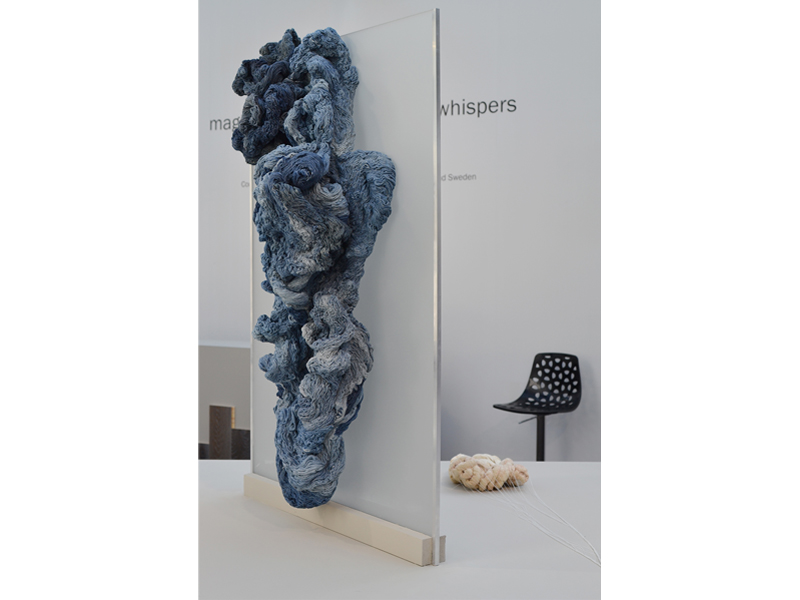 Exhibition view, magic language///game of whispers, 2015, work nº14 (foreground) is Secrets(blue) by Hanne Friis; work nº15 (background) is Das Unheimliche by Miro Sazdic, photo: André Gali Exhibition view, magic language///game of whispers, 2015, work nº14 (foreground) is Secrets(blue) by Hanne Friis; work nº15 (background) is Das Unheimliche by Miro Sazdic, photo: André Gali