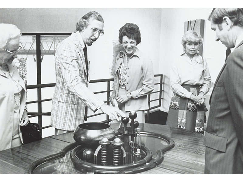 Paul J. Smith (second from left), director of the Museum of Contemporary Crafts, Joan Mondale (center), and Barbara Rockefeller 