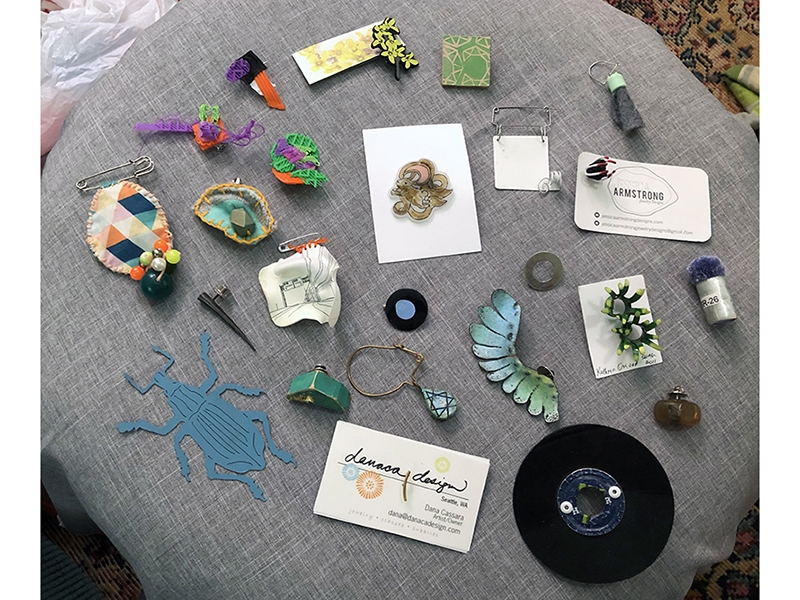 Maggie began participating in the Pin Swap at the 2011 Seattle SNAG conference. This is a small selection of her Pin Swap collection, 2019, photo: Kathleen Kennedy Maggie Smith Pin Swap Collection