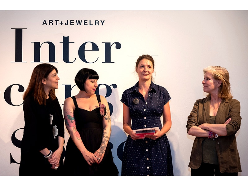 Niki Stylianou and Erato Kouloubi present the AJW19 award to Central Exhibition participant Lucie Popelka Hudková, 2019, photo: Orestis Rovakis Niki Stylianou and Erato Kouloubi present the AJW19 award