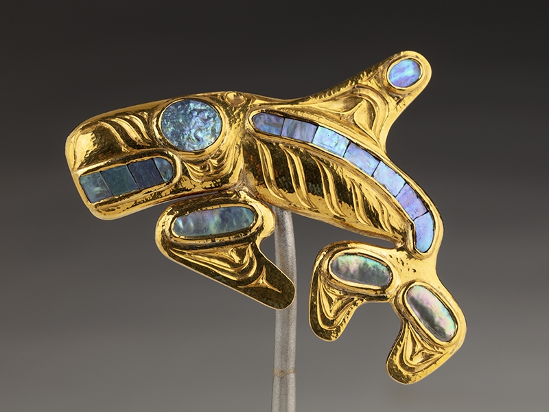 Bill Reid, Killer Whale Brooch, 1964, gold, abalone, 55 x 57 mm, courtesy of the Museum of Anthropology, The University of British Columbia, Vancouver, 3258/10, Collection of Dr. Margaret (Marmie) Perkins Hess, photo: Kenji Nagai, copyright Bill Reid Estate - thanks to Dr. Martine J. Reid, President, Bill Reid Estate Bill Reid, Killer Whale Brooch