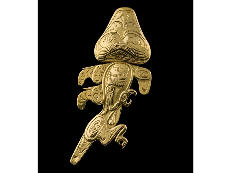 Bill Reid, Dogfish Brooch, After a Tattoo Design by Charles Edenshaw, circa 1958, 22-karat gold, 82 x 33 mm, private collection, photo: Kenji Nagai Bill Reid, Dogfish Brooch, After a Tattoo Design by Charles Edensha