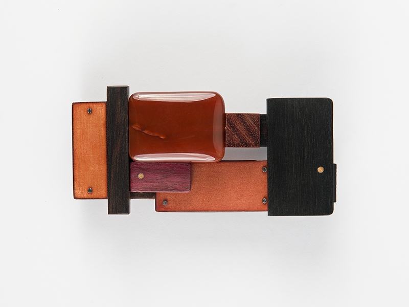 Anne Léger, Clair Obscur, 2016, brooch, wood, copper, enamel, steel, carnelian, 60 x 115 x 25 mm, photo: Thomas Tveter Anne Léger, Clair Obscur
