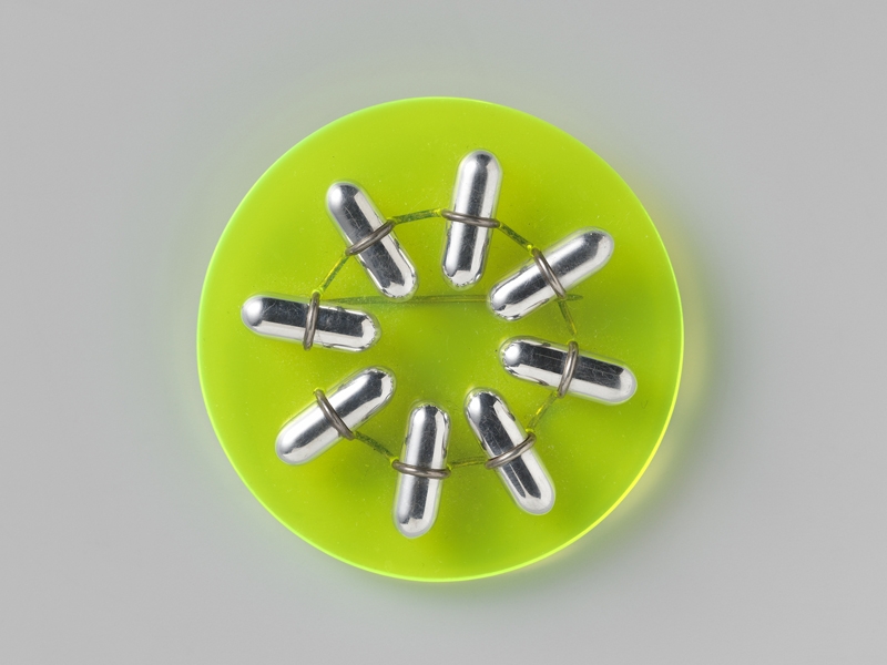 Paul Derrez (born 1950), Pill-Roulette, 2003, silver, aluminum, Perspex, 60 mm diameter, Rijksmuseum, Amsterdam, Gift of Marjan and Gerard Unger, Bussum 2009, copyright Paul Derrez, photo: Rijksmuseum staff Paul Derrez, Pill-Roulette