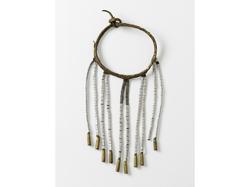 Borona, traditional beard jewelry, mid 20th century, leather, aluminum, cartridge cases, 533 x 240 x 40 mm, Die Neue Sammlung – The Design Museum, photo: Die Neue Sammlung – The Design Museum (A. Laurenzo) Borona, traditional beard jewelry, mid 20th century, leather, aluminum, cartridge cases, 533 x 240 x 40 mm, Die Neue Sammlung