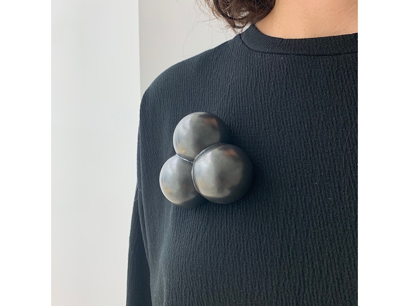 Noon Passama, Extra Button, 2011, jewelry, oxidized silver (electroformed), matte finish, acrylic backing, 79 x 79 x 37 mm, photo: René Darmont Noon Passama, Extra Button