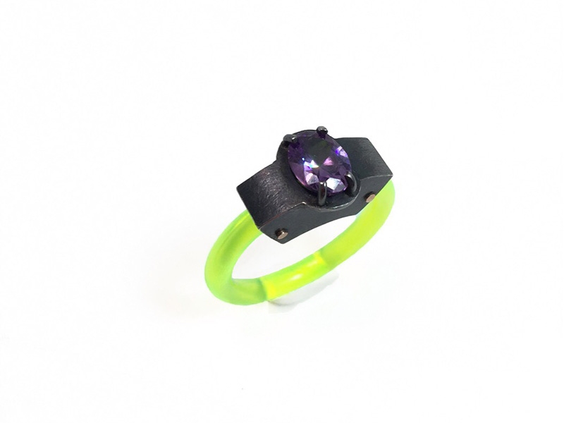 Anna Lindsay MacDonald, Laika Signet, 2018, ring, amethyst, acrylic, oxidized sterling silver, 14-karat gold rivets, photo: artist Anna Lindsay MacDonald, Laika Signet