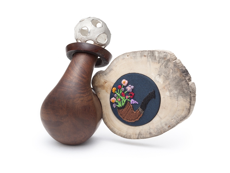 Josée Desjardins, Rencontre Impromptue 3, 2017, brooch, driftwood, sterling silver, brass, fragment of dark blue taffeta dress (from her mother), embroidery, pipe wood (from her father), 108 x 90 x 43 mm, photo: Anthony McLean Josée Desjardins, Rencontre Impromptue 3