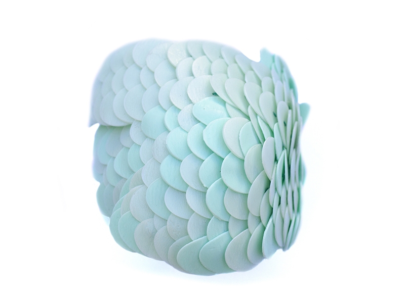 Karin Roy Andersson, Parakeet, 2018, bracelet, recycled plastic (soap bottles), thread, 70 x 70 x 80 mm, photo: artist Karin Roy Andersson, Parakeet, 2018