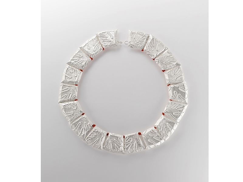 Julie Blyfield, Relic, 2013, neckpiece, sterling silver, red cord, outside diameter of neckpiece 210 x 185 x 10 mm, photo courtesy of Zu design Julie Blyfield, Relic