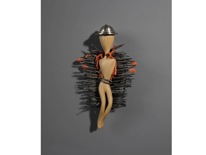 Bruce Metcalf and Kiff Slemmons, Hot Bed Brooch and Case, 2006, silver, carved wood fragment, coral (brooch), handmade paper (box), brooch: 112 x 64 x 25 mm, open box: 75 x 326 x 220 mm, closed box: 60 x 160 x 200 mm, photo courtesy of Cooper Hewitt, Smithsonian Design Museum Bruce Metcalf and Kiff Slemmons, Hot Bed Brooch and Case