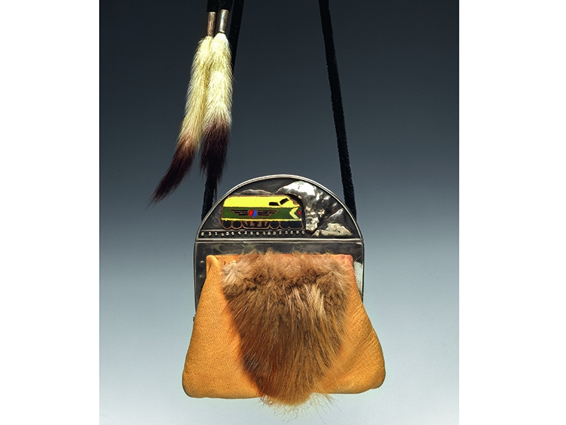 Merrily Tompkins, Snatch Purse, 1975, copper, enamel, leather, beaver fur, ermine tails, coin purse, 114 x 102 x 10 mm, collection of the Merrily Tompkins Estate, Ellensburg, copyright Merrily Tompkins Estate, Ellensburg, photo: Thomas R. DuBrock Merrily Tompkins, Snatch Purse