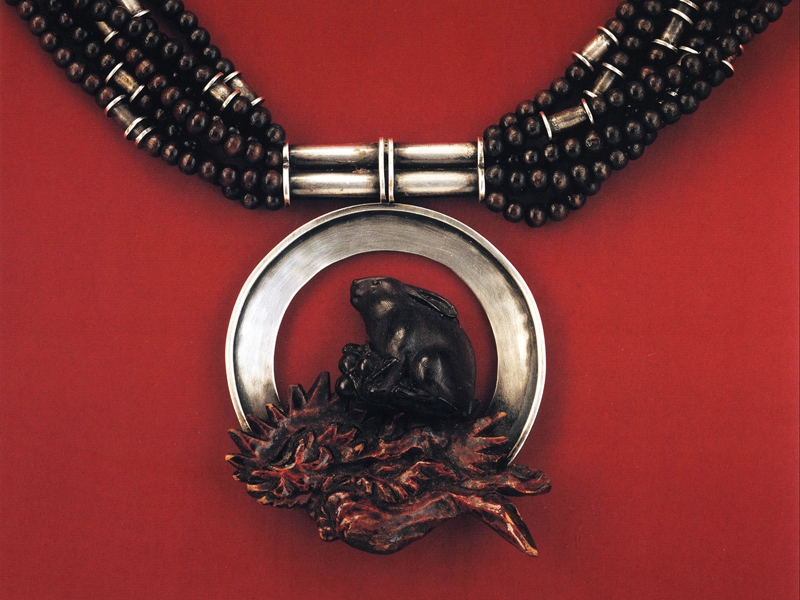Ron Ho, Year of the Hare, 1975, necklace, sterling silver, carved wood, wooden beads, overall measurements 483 x 57 x 19 mm, pendant 89 x 70 x 6 mm, photo: Rex Rystedt Photography Ron Ho, Year of the Hare