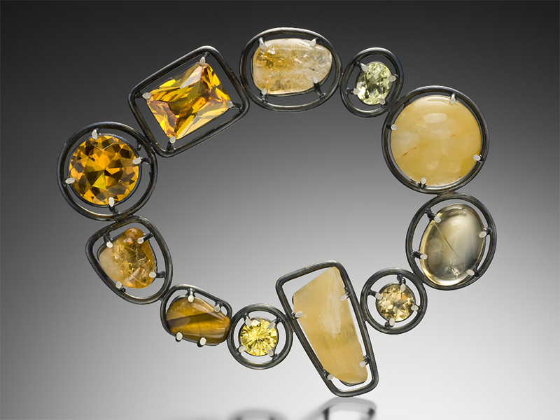 Joanna Gollberg, Yellow Brooch, 2015, brooch, oxidized sterling silver, lemon quartz, citrine, tiger eye, yellow fluorite, CZ, glass, 95 x 89 x 19 mm, photo: artist Joanna Gollberg, Yellow Brooch, 2015