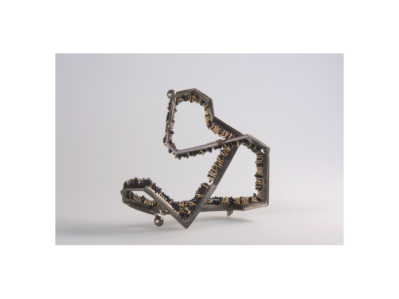 Petra Zimmermann, Endless, 2017, brooch, blackened German silver, antique glass and metal beads, silk, 80 x 90 mm, photo: artist Petra Zimmermann, Endless
