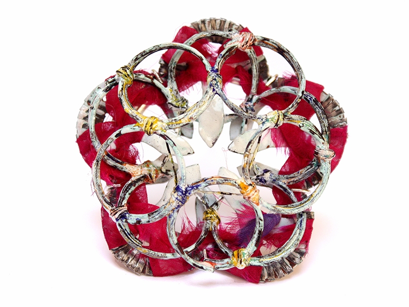 Vershali Jain, Bandhej Circles, 2018, brooch, silver, copper, steel wires, liquid vitreous enamels, vintage fabric, 58 x 58 x 18.5 mm, photo: artist Vershali Jain, Bandhej Circles