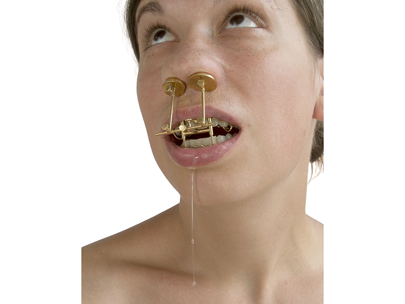 Lauren Kalman, Device for Filling a Void 1, 2014, sculpture, gold-plated electroformed copper, brass, 102 x 102 x 102 mm, photo courtesy of the artist. The piece and photograph are shown together as an installation. Lauren Kalman, Device for Filling a Void 1