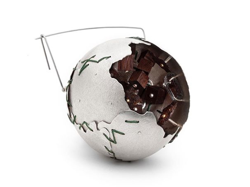 Justine Bonnin, Brooch Phase 4, sterling silver, wood, rust, 24-karat gold, cotton thread, stainless steel, 60 x 60 x 60 mm, photo courtesy of L.A. Pai Gallery Justine Bonnin, Brooch Phase 4