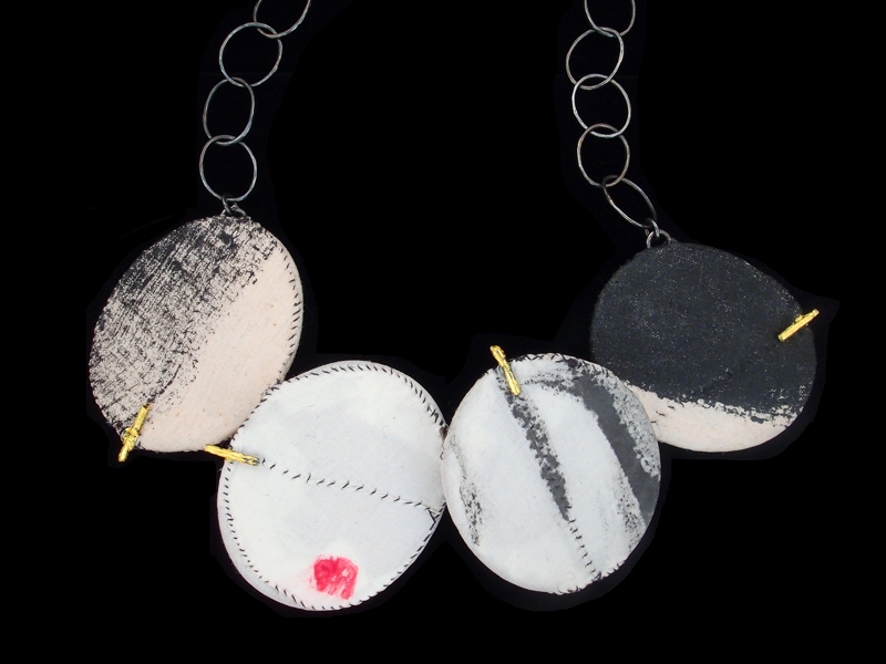 Myung Urso, Vertical 4 Ovals, necklace, 23-karat gold leaf, Asian ink, cotton, lacquer, oxidized sterling silver, thread, 559 mm long, each oval approximately 57–64 mm, photo: Andrea Marx Myung Urso, Vertical 4 Ovals