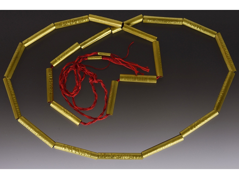 Mia Straka, Valere Talisman, 2018, necklace, brass, silk and cotton cord, 1,000 x 73 x 73 mm, photo: Michael Couper Mia Straka, Valere Talisman