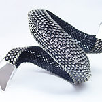 Hanne Behrens, Bracelet, woven oxidized sterling silver, 127 mm long x 64 mm diameter, photo: courtesy of Mobilia Gallery 2012