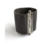 "Maker unknown, silver mesh cuff from India"