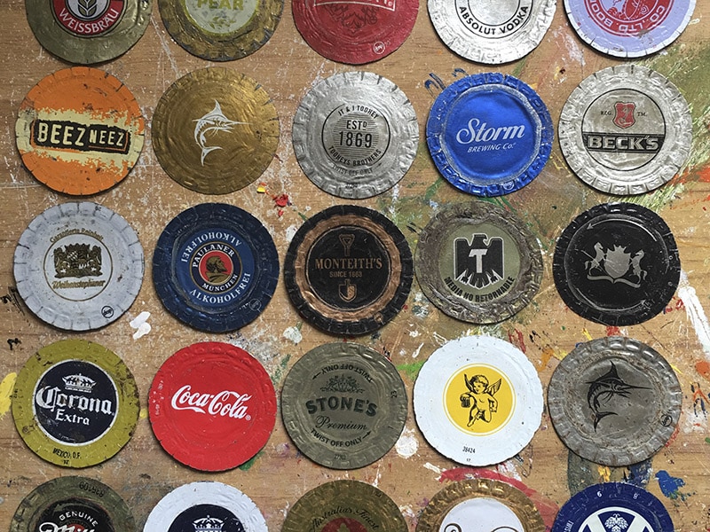 Bottle tops collected in The Netherlands, Suriname, and New York
