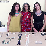 (Left to right) Telma Oliveira, Ana Pina, and Olga Marques at the Tincal lab display, photo courtesy of Ana Pina