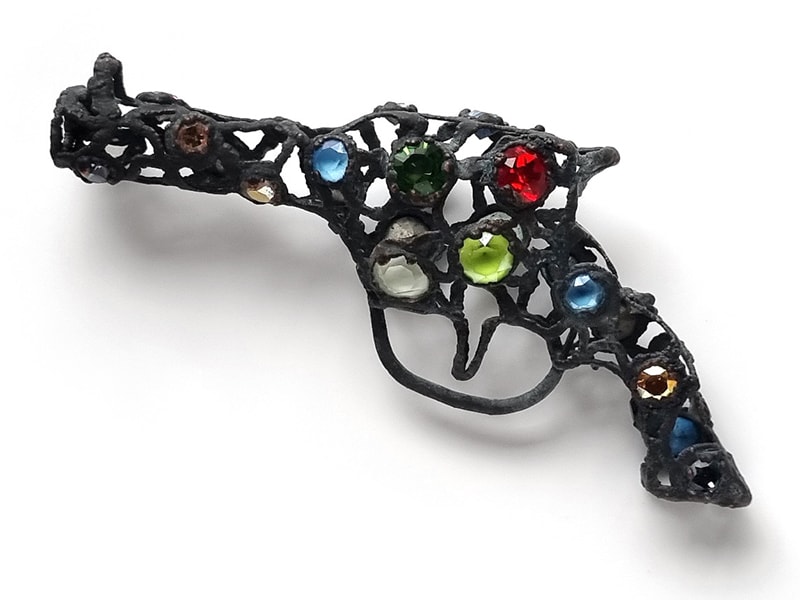 Bejeweled Pistols and Guns That Can Melt