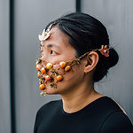 Bound Headpiece Series Medium: Brass, copper, silver, gemstones Amy Hsieh, 2020 Photo by: Alyssa Wong COVID has restrained us in terms of our day to day lives, yet there is the exception of wearing masks to conduct essential activities. I chose to create a headpiece that incorporates a mask over the nose and mouth that is constructed of linked pieces to allow for gaps of exposure to the outside world. Quarantine has allowed us to have limited visibility to our normal activities, and we are uncomfortably bound during those interactions. IG: @littlexraygirl