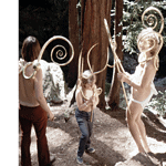 Susan: Another relatively unknown jeweler from the Bay Area, William Clark, is an excellent example of an artist who lived the counterculture lifestyle and made jewelry, or shall we say body sculpture, for the community of fantasy-oriented hippies. Here are his body ornaments being worn in what is perhaps a spring ritual in the redwood forest.

Some of the artists in the book, like Sharon Church, Arline Fisch, and even Fred Woell, weren’t usually considered either alternative or counterculture, but we found ways in which their political stands or their jewelry were steeped in the times. We wanted to feature artists who reflected those times—like art does—and who were not simply decorative or technical makers. 

Toni: Did Laurie think of herself as part of the counterculture?

Susan: She was really an outsider/fashion hippie, with a teaching job and a schedule to keep. Many of her students were part of the counterculture. Many artists we talked to about the counterculture, including Laurie, thought that because they had jobs and were responsible people, they couldn’t be part of it, but we found it to be more about their political views and alliances, outfits, cars, what they were reading, and if they took drugs and so forth. They could still have jobs. | William Clark,Dancers in Muir Woods, 1970s