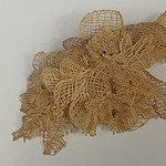 Sofia Bjorkman, who is Swedish, melts a mixture of wood and polylactic acid, which is made of different starches such as corn, and draws with the substance. The result is the brooch “Basketry,” which resembles a woven basket blooming with floral-like shapes. The work makes reference to a 1957 book that describes basket weaving as “an ideal activity for difficult and anxious times.” | Sofia Bjorkman, Basketry, photo: Jennifer Altmann 