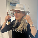 Jaanika Peerna tries on a silver necklace by Ute Decker. Photo: Jennifer Altmann
