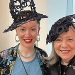 Handmade hats by Zoe Sherwood were worn by (left to right) the artist and Michele Cohen, chair of the board of trustees of the MAD Museum. Cohen’s hat says “Museum of Arts and Design.” Sherwood’s jewelry and hats use words to tell stories and create visual patterns. “I call my pieces wearable reminders,” she says. “They start conversations.” Photo: Jennifer Altmann